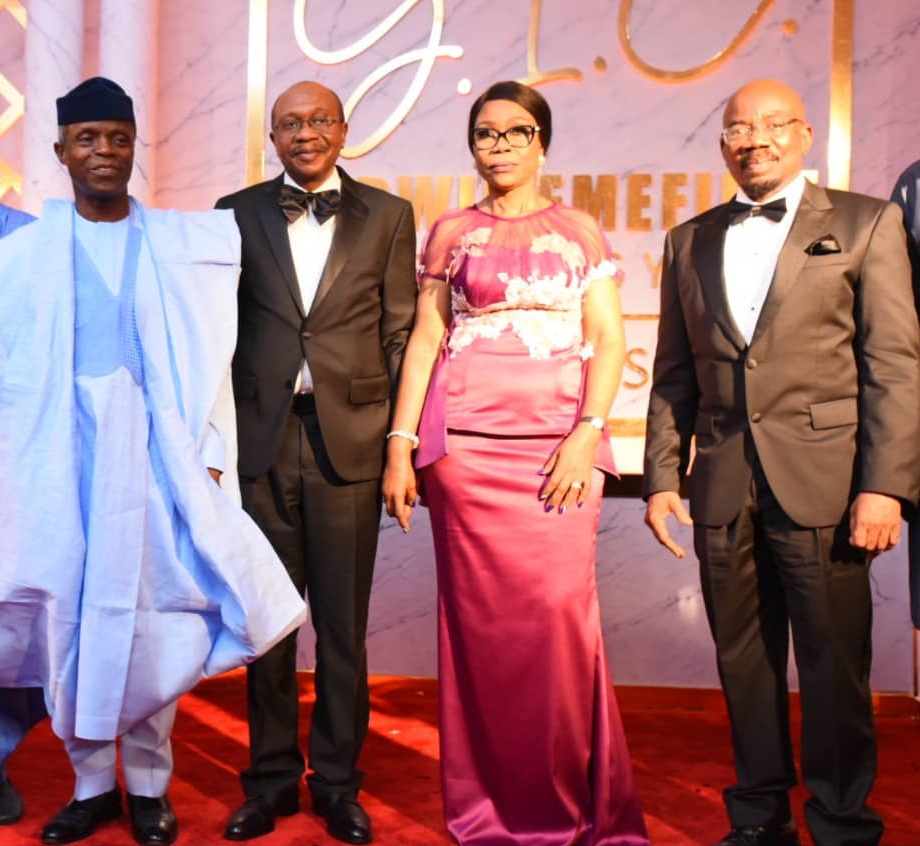 Vice President Yemi Osinbajo, SAN (GCON); CBN Governor, Mr. Godwin Emefiele (CON); Wife of the CBN Governor, Mrs Margaret Emefiele; and Chairman, Zenith Bank Plc, Mr. Jim Ovia (CON) at a reception organised by the private sector in honour of the CBN Governor at the Civic Centre, following a family thanksgiving service at the Catholic Church of Assumption, Falomo, Lagos, on Sunday.