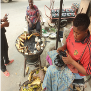 Mama Kelechi at her shop doing what she does best